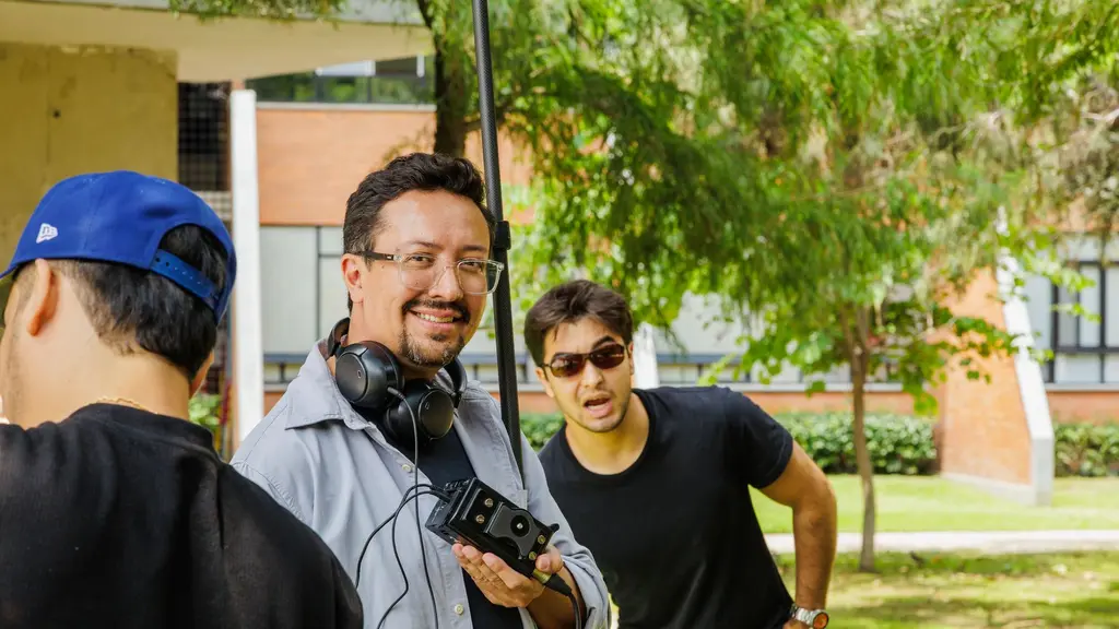 a director watching a monitor on set