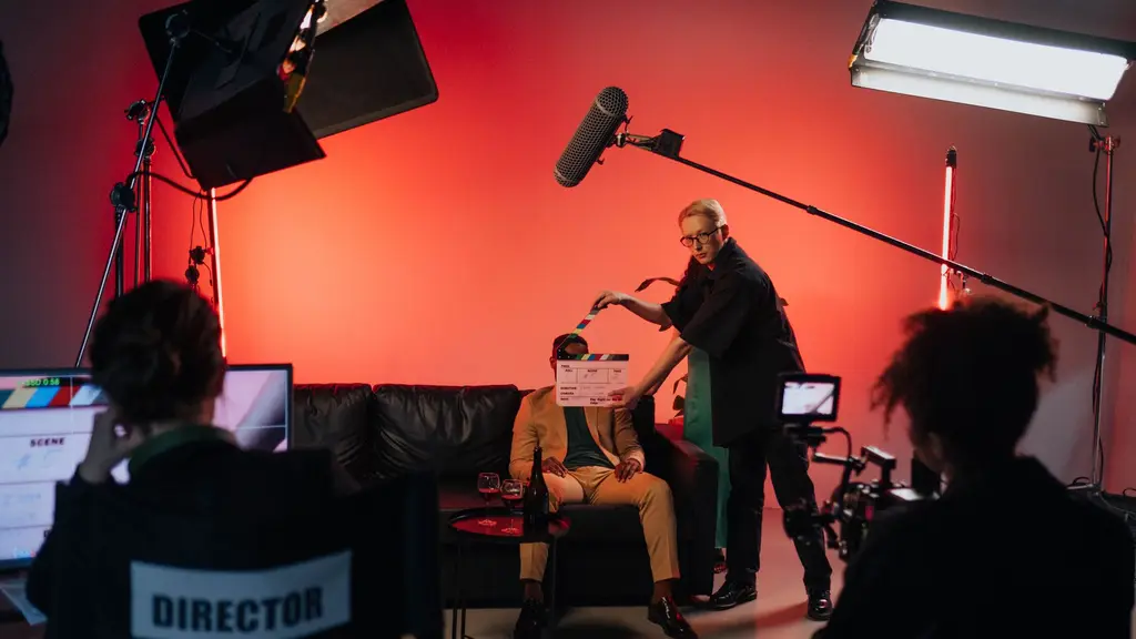 a director watching a monitor on set