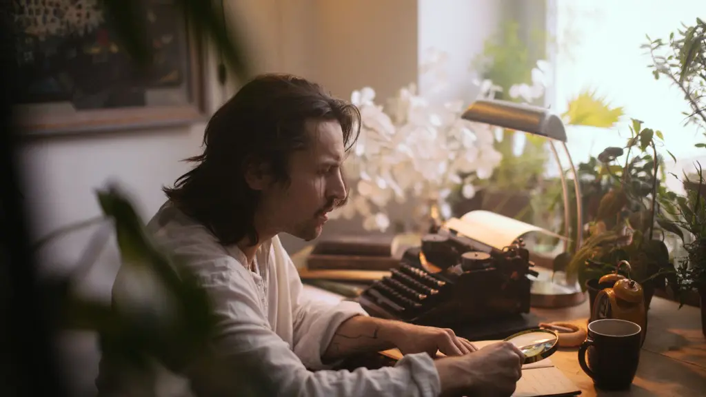 a vintage typewriter on a writer's desk under a lamp